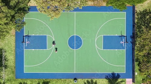 Sport activity and lifestyle. Sport and leisure activity. Aerial basketball court field. Sport and hobby. Outdoor basketball field court. Basketball field top aerial view, 4k footage