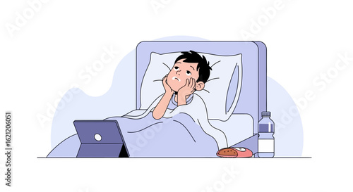 Bored Young Man Lying In Bed Watching A Tablet At Night In The Bedroom