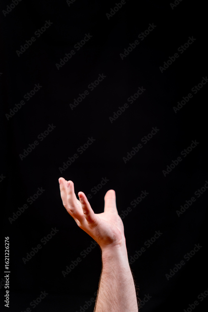 Cupped Hand Holding a Void on a Black Background Cupped Hand Holding a Void on a Black Background