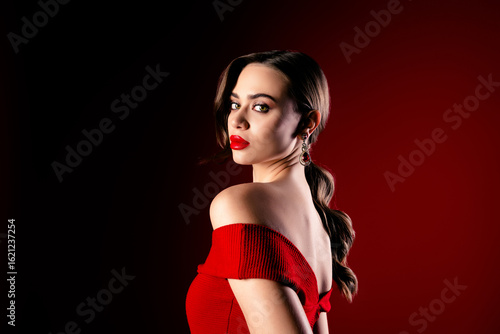 Wallpaper Mural Glamorous young woman in red dress with elegant jewelry, styled hair, confident expression and luxury background Torontodigital.ca