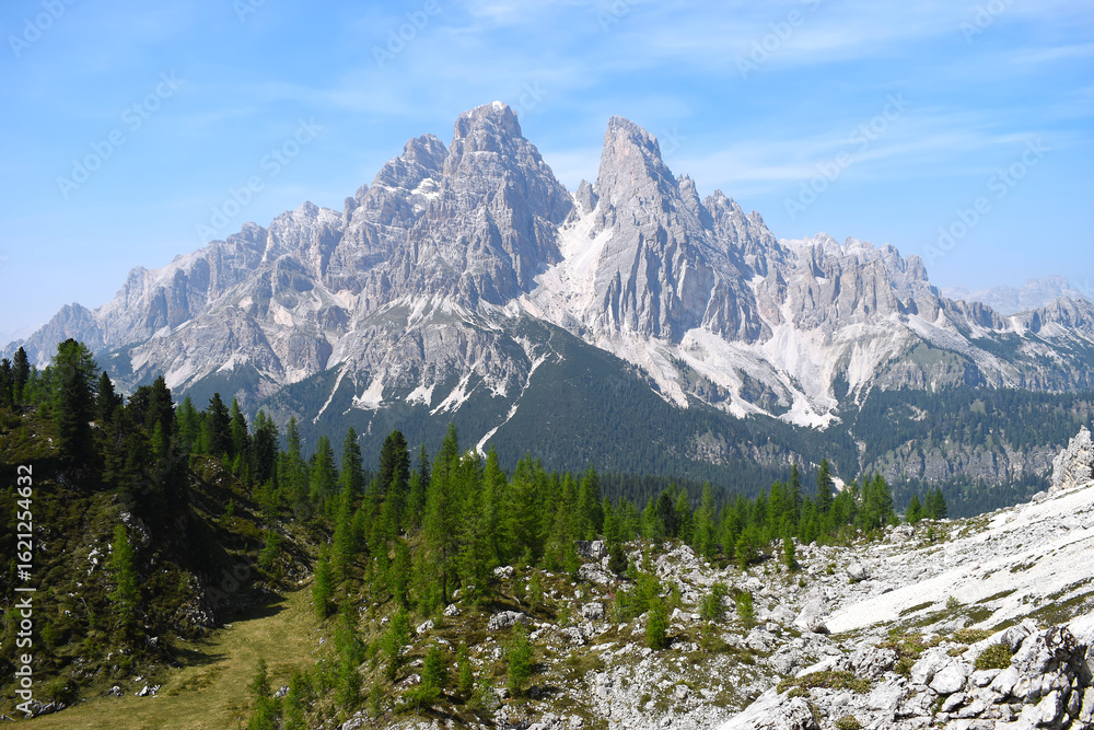 Fototapeta premium View of the south side of Monte Cristallo, a mountain within the Kristallspitze massif in the Italian Dolomites range in the Ampezzo Dolomites Natural Park, northeast of Cortina d'Ampezzo, Italy.