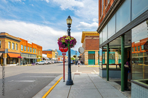 Fototapeta Naklejka Na Ścianę i Meble -  The historic 19th century Main Street of shops and cafes through the old west small town of Livingston, Montana.