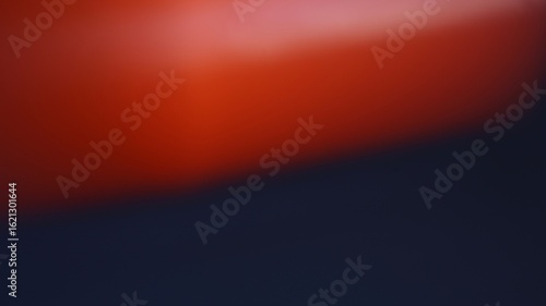 Abstract Composition: Bold Color Blend: A dynamic abstract composition blends vibrant shades of red and blue in a visually captivating design, evoking feelings of energy and depth. 