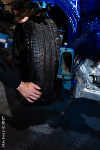 Fotografija Performance wheel install on tuned suspension with visible brake system