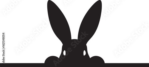 Black silhouette of a rabbit peeking over a surface