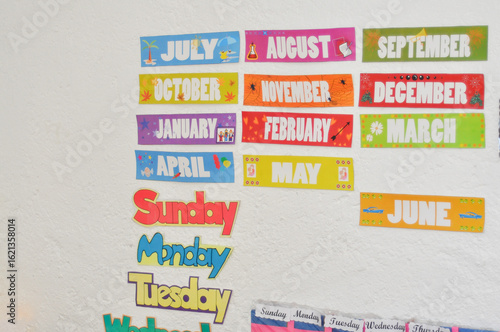 Colorful classroom wall with months and days of the week labels