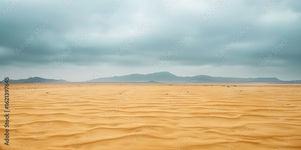 Fototapeta premium Desert dunes beneath dramatic storm clouds in moody sky 