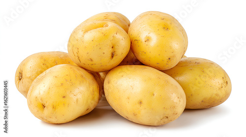 A pile of fresh yellow potatoes isolated on white background