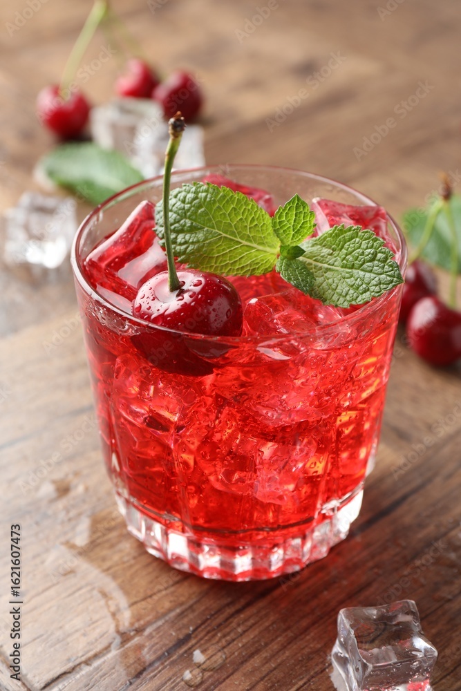 custom made wallpaper toronto digitalTasty cherry soda with ice cubes, berries and mint in glass on wooden table, closeup