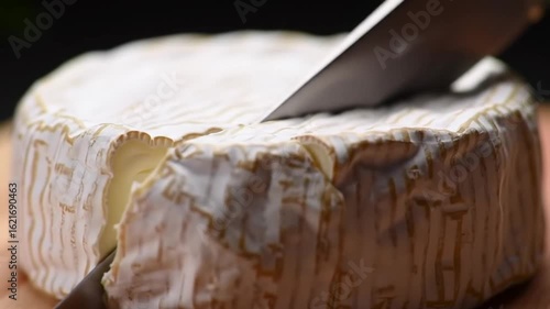 Wallpaper Mural Creamy Camembert: Slicing into Indulgence - A Close-Up Food Video Torontodigital.ca