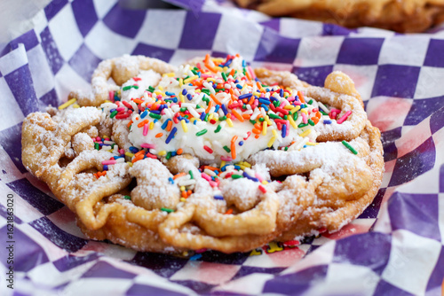 Close-Up of Freshly Made Fairground Funnel Cake with Powdered Sugar