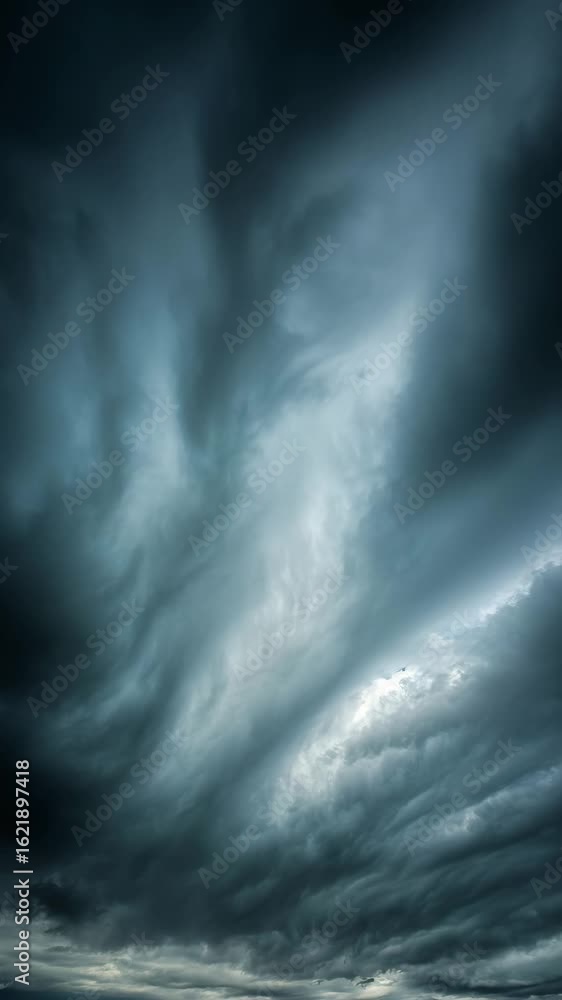 Dark and dramatic cloudscape, moody atmospheric gray and blue tones, low light, textured clouds filling the frame. Ominous, powerful storm clouds. Dark and dramatic cloudscape, moody atmospheric gray and blue tones, low light, textured clouds filling the frame. Ominous, powerful storm clouds.