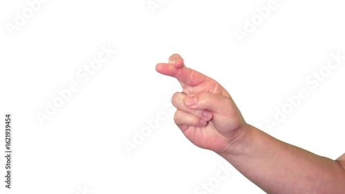 Hand sign of a male hand fingers crossed in front of a whit background	