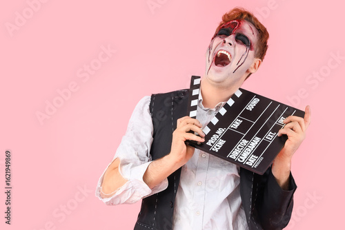 Scary young man dressed for...