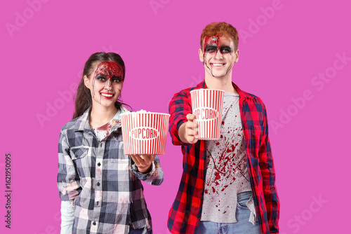 Young couple dressed for Ha...