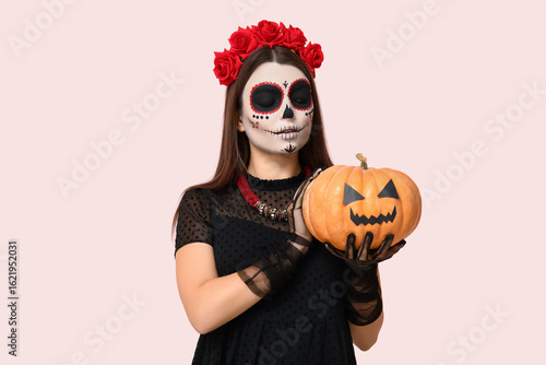 Young woman dressed for Hal...