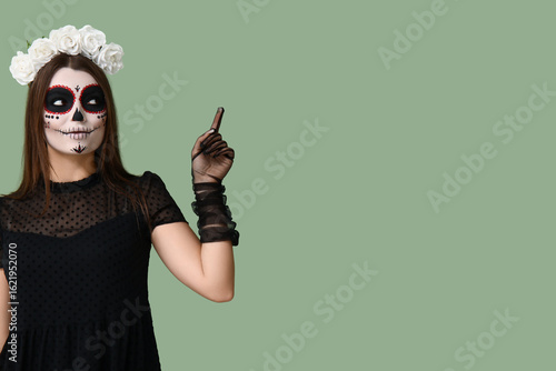 Young woman dressed for Hal...