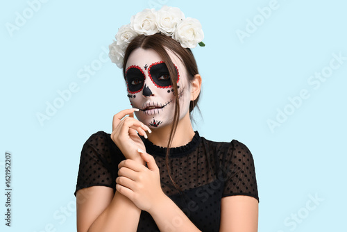 Young woman dressed for Hal...