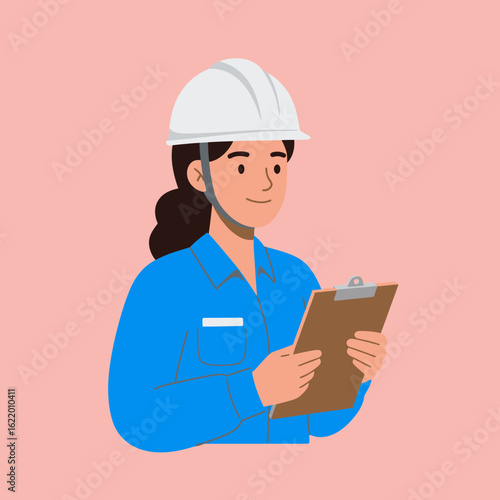 A female engineer in a blue work uniform and white hard hat smiles while reviewing a clipboard, suggesting expertise and professionalism in a modern workplace.