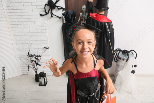 Teenage girl dressed for Ha...