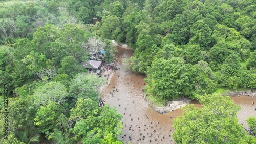 Traditional fishing by the Dayak tribe in East Barito, Central Kalimantan using a long spear called Tariuk