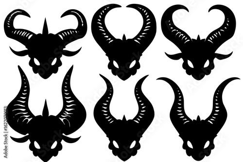 A collection of six black silhouette demon heads with various imposing horn shapes. A vector graphic set for fantasy or gothic design concepts.