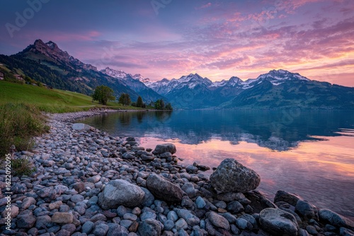 Wallpaper Mural Sunrise over Swiss Alps lake, calm water reflecting mountains; idyllic pastoral scene, travel postcard Torontodigital.ca