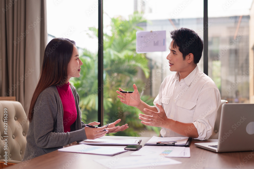 Fototapeta premium Asian business professionals adult discuss project strategies ideas collaborating sharing insights planning future growth modern office meeting room financial hub