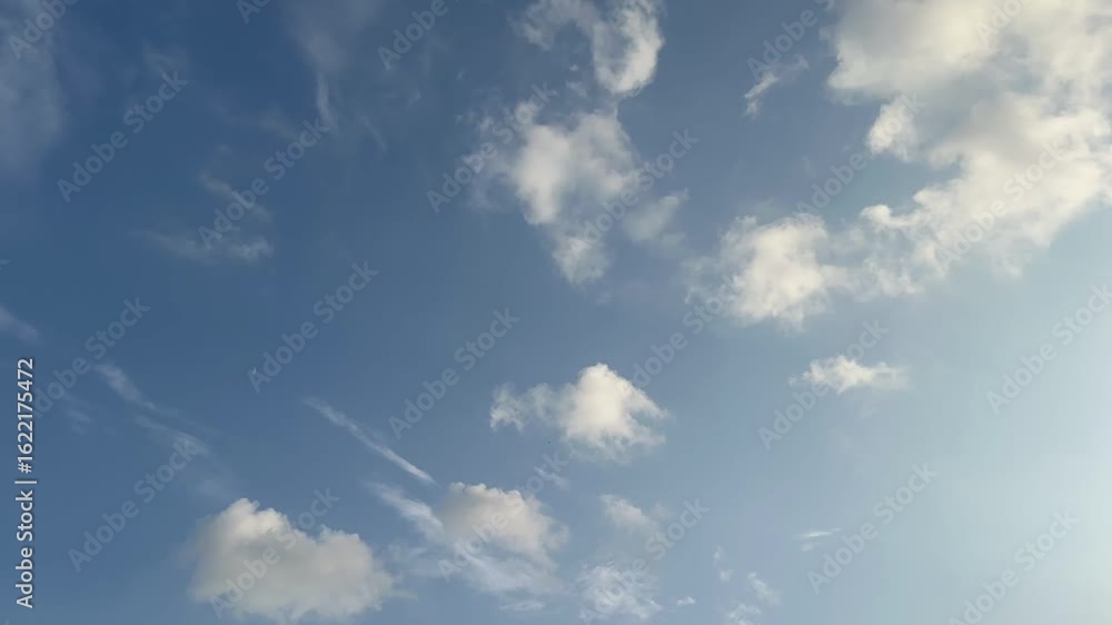 4K timelapse video of clouds moving across the sky. Fast motion shows dynamic cloud patterns and changing weather. Ideal for nature, time, atmosphere, or cinematic visuals. 4K timelapse video of clouds moving across the sky. Fast motion shows dynamic cloud patterns and changing weather. Ideal for nature, time, atmosphere, or cinematic visuals.