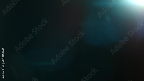 Real Shooted Cinematic Lens Flare Overlay on Black Background at 1000fps Slow Motion.
