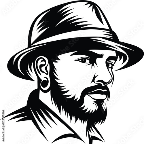 Bearded man wearing a hat with an earring gazes pensively to the side in black and white