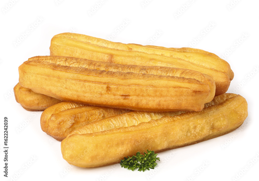 Crispy fritters served as traditional breakfast snacks on a white background for a delightful morning treat Crispy fritters served as traditional breakfast snacks on a white background for a delightful morning treat