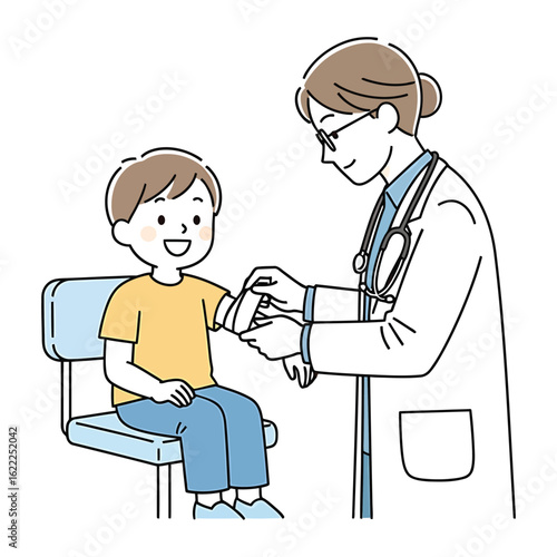 A friendly pediatrician consults a young boy patient during a medical checkup