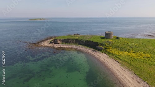 Martello towers on serene islands near Dublin, Ireland, with scenic views