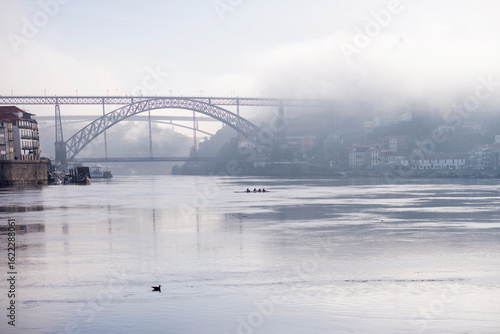Misty morning over Douro River and Luís I Bridge
