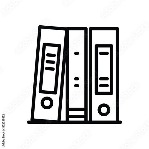 Three ring binders stand upright
