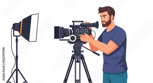 Dedicated filmmaker operates professional video equipment in a studio setup for shooting the perfect shot