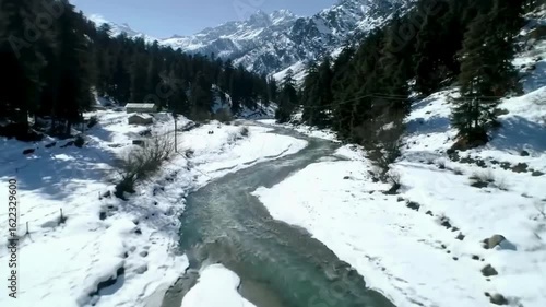 Aerial Drone Shot of Snow Covered Mountains Winter Landscape and Peaks 4K

