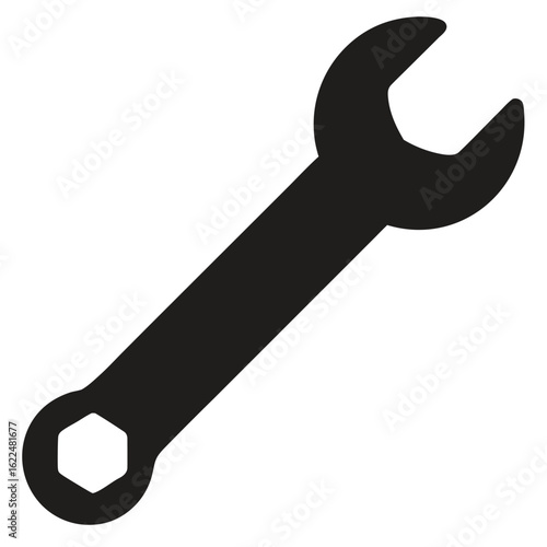 An isolated, old, rusty metal wrench, nut, and bolt are essential vintage tools for construction work