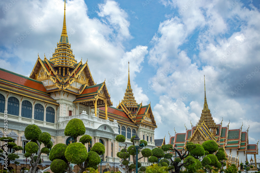 Fototapeta premium View of the Chakri and Dusit palaces in the Grand Palace complex in Bangkok, Thailand in daylight
