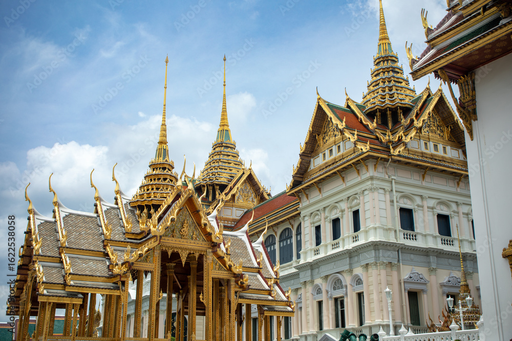 Fototapeta premium View of the golden pavilion of Abhorn Bimok in the palace complex of the Grand Palace in Bangkok, Thailand in daylight