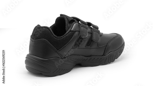 New delhi, India, AUGUST 01, 2025, New leather student shoes isolated on white background, prepare for back to school concept