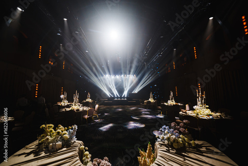 Elegant event setup with spectacular lighting at evening venue