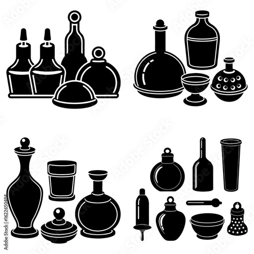 Collection of various black and white bottles and containers in different shapes and sizes arranged together