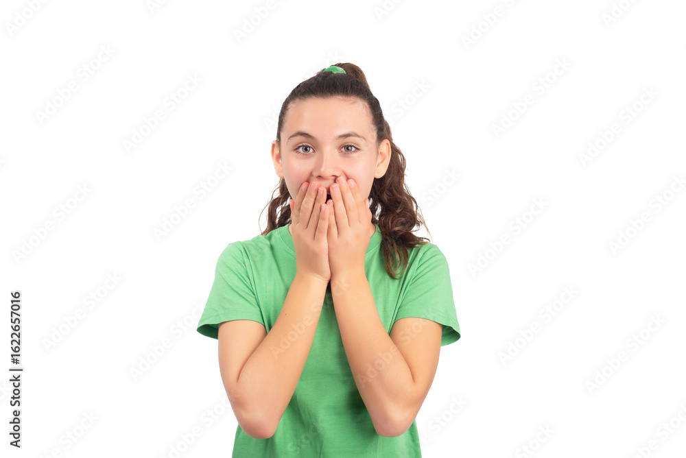 Surprised teen girl covering her mouth with both hands. Shock, gossip or unexpected news concept Surprised teen girl covering her mouth with both hands. Shock, gossip or unexpected news concept