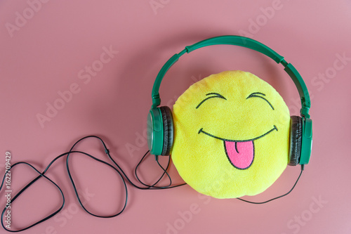 funny smiley with green headphones