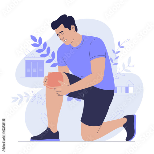 Young man kneeling and holding his knee in rehabilitation setting  