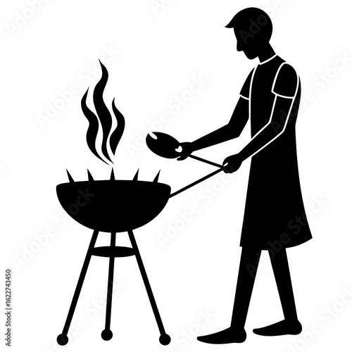 Person grilling food on barbecue cooking