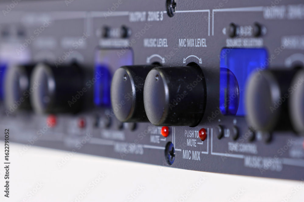 Obraz premium Front control panel of the audio amplifier with level controls and display