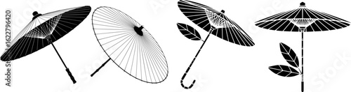 Black paper parasols with decorative leaves umbrella white